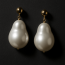How to Style Baroque Pearl Statement Earrings for Modern Edge